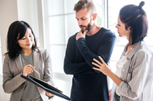 three people having discussion