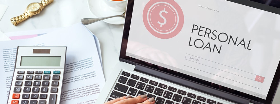 hand on laptop keyboard